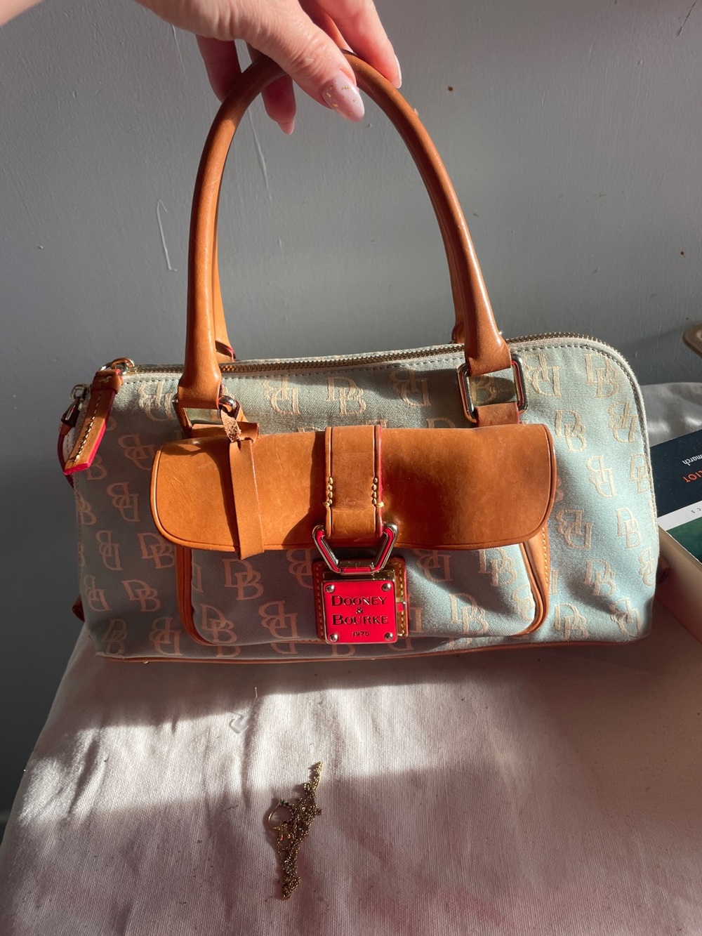 Dooney & Bourke Cream Canvas Satchel with Tan Leather Trim and Red Accent